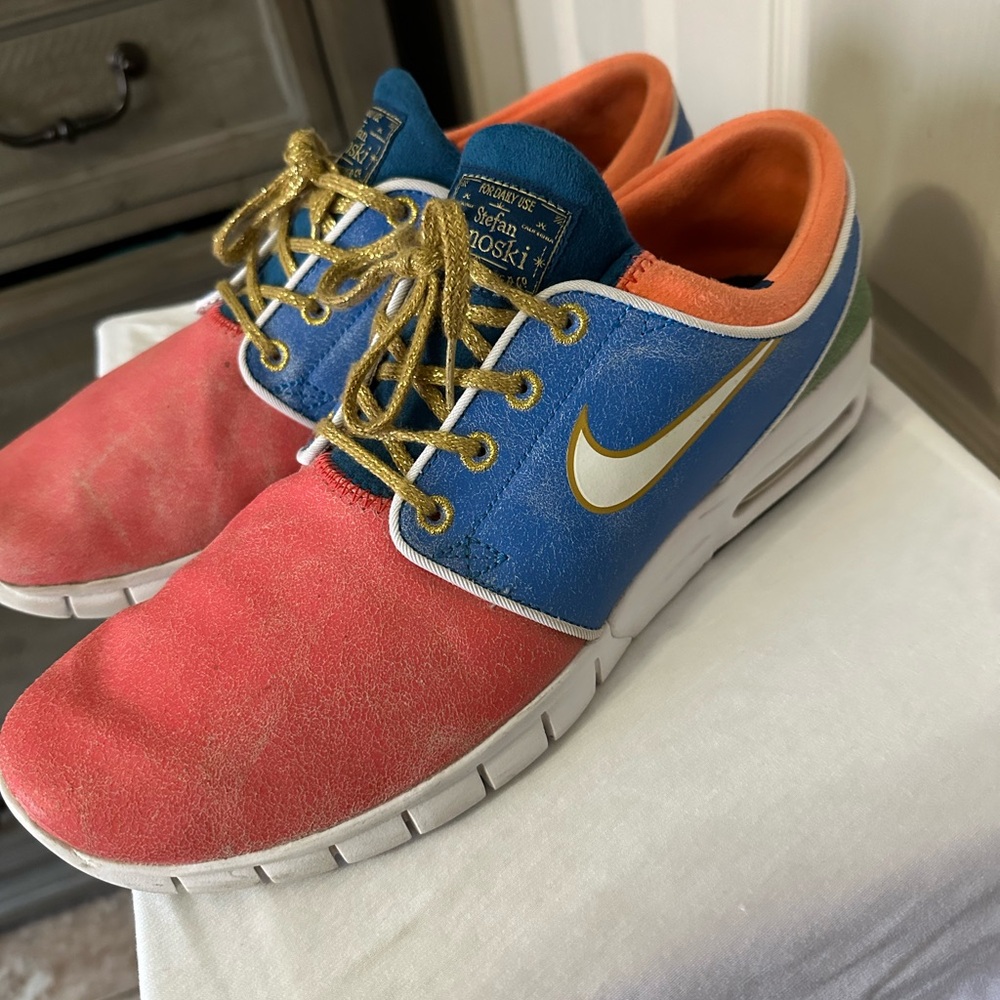 Nike Sneakers with Blue and Red Highlights